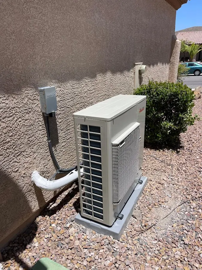 Residential air conditioning condenser unit in Powell